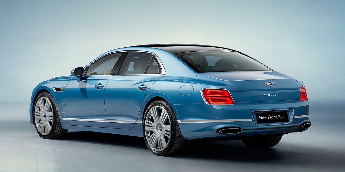 Bentley Singapore New Bentley Flying Spur Azure sedan rear view in Light windsor blue by Mulliner paint with 22 inch Azure wheels and chrome exterior details