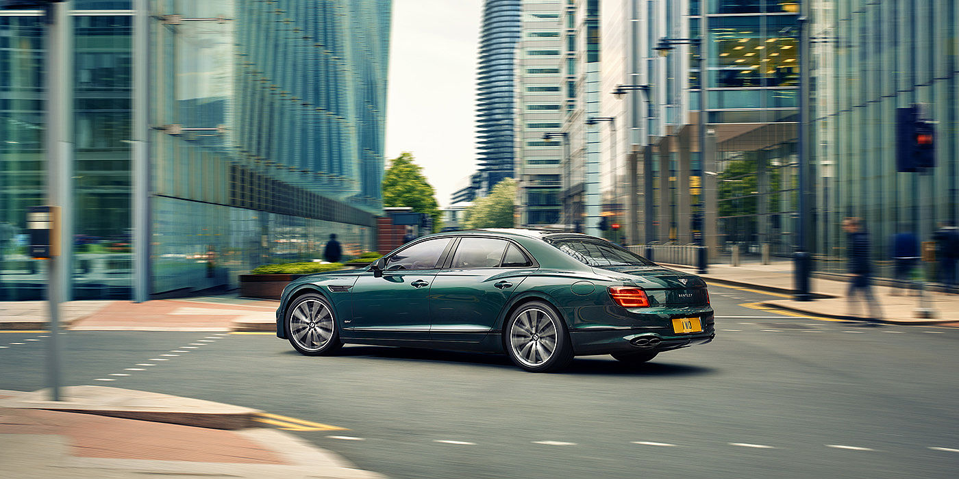 Bentley-Flying-Spur-Hybrid-profile-from-rear-in-Viridian-paint