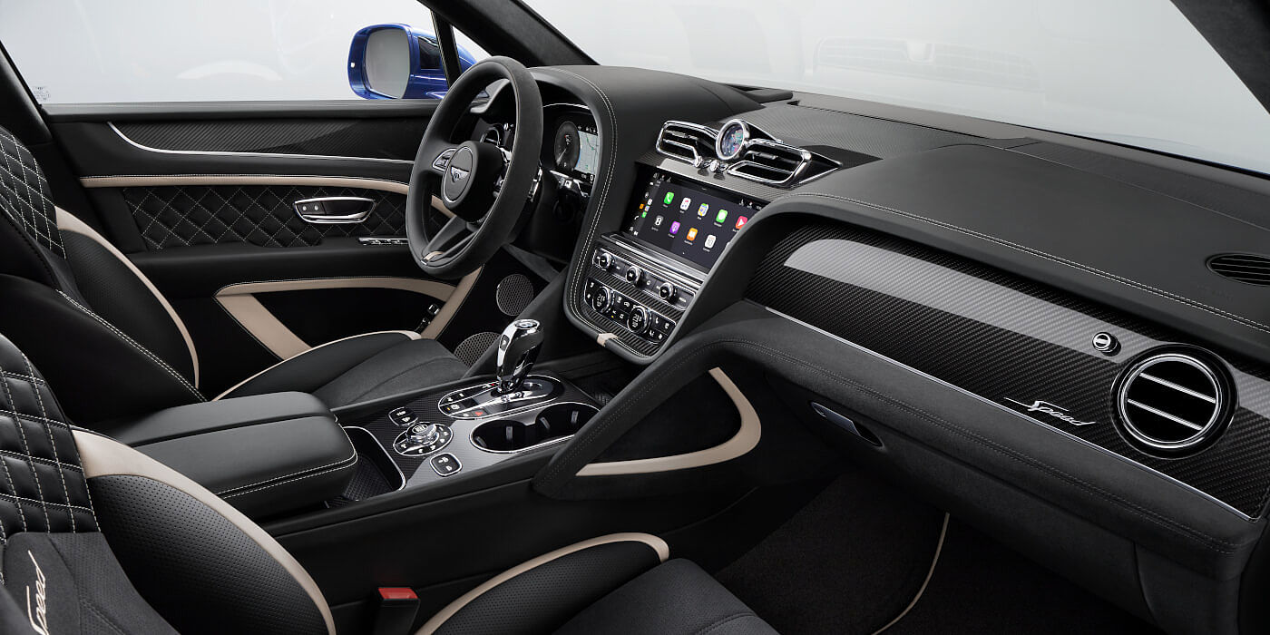 Bentley Singapore Bentley Bentayga Speed SUV front interior in Beluga black and Linen hide with carbon fibre veneer