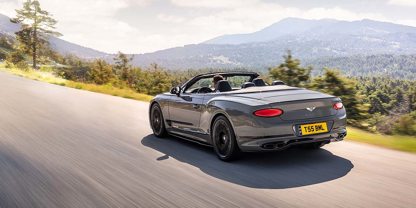 Bentley Singapore Bentley Continental GTC S convertible in Cambrian Grey paint rear 34 dynamic driving