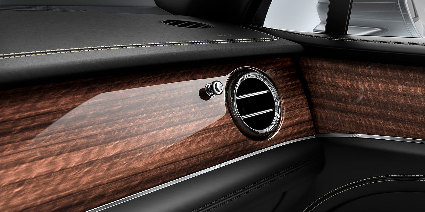 Bentley Singapore Bentley Bentayga front interior Crown Cut Walnut veneer and chrome air vent.