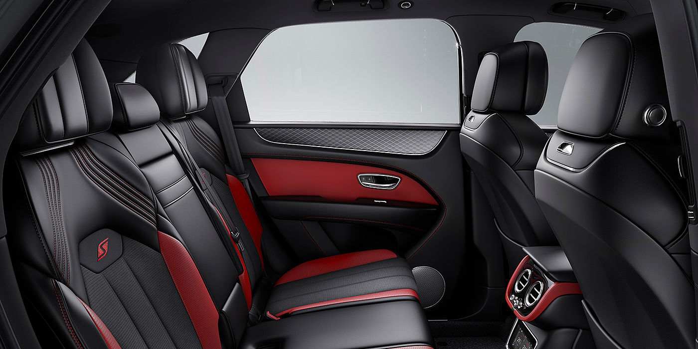 Bentley Singapore Bentey Bentayga S interior view for rear passengers with Beluga black and Hotspur red coloured hide.