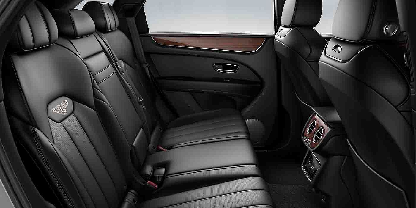 Bentley Singapore Bentley Bentayga EWB interior view for rear passengers with Beluga black hide.