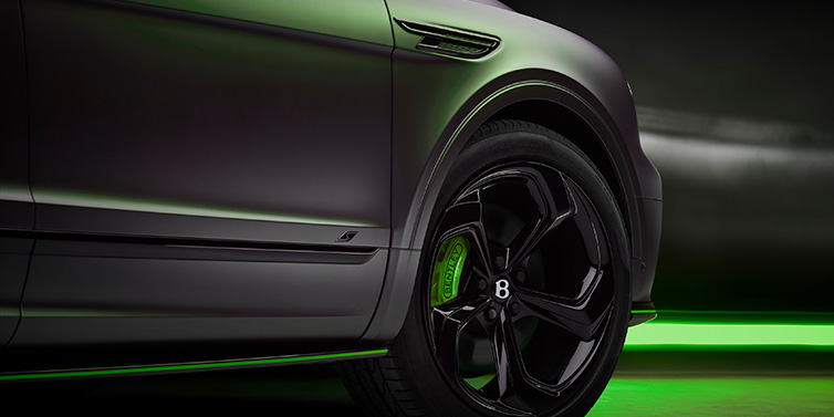 Bentley Singapore Bentley Bentayga S Black Edition SUV exterior wheel detail with Cyber Green brakes with Anthracite Satin paint