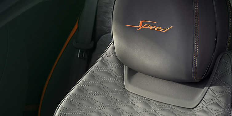 Bentley Singapore Bentley Continental GT Speed coupe seat detail in Gravity Grey hide and Speed emblem in Mandarin by Mulliner coloured embroidery